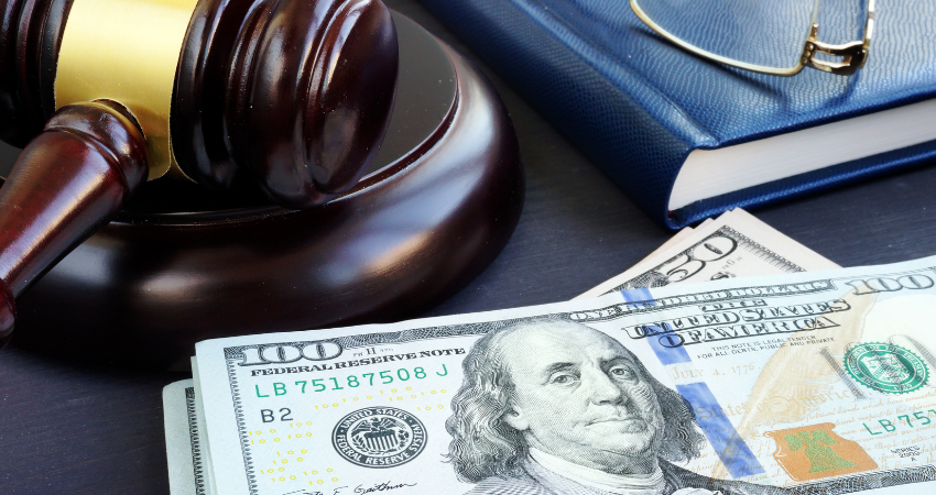 gavel next to stack of money